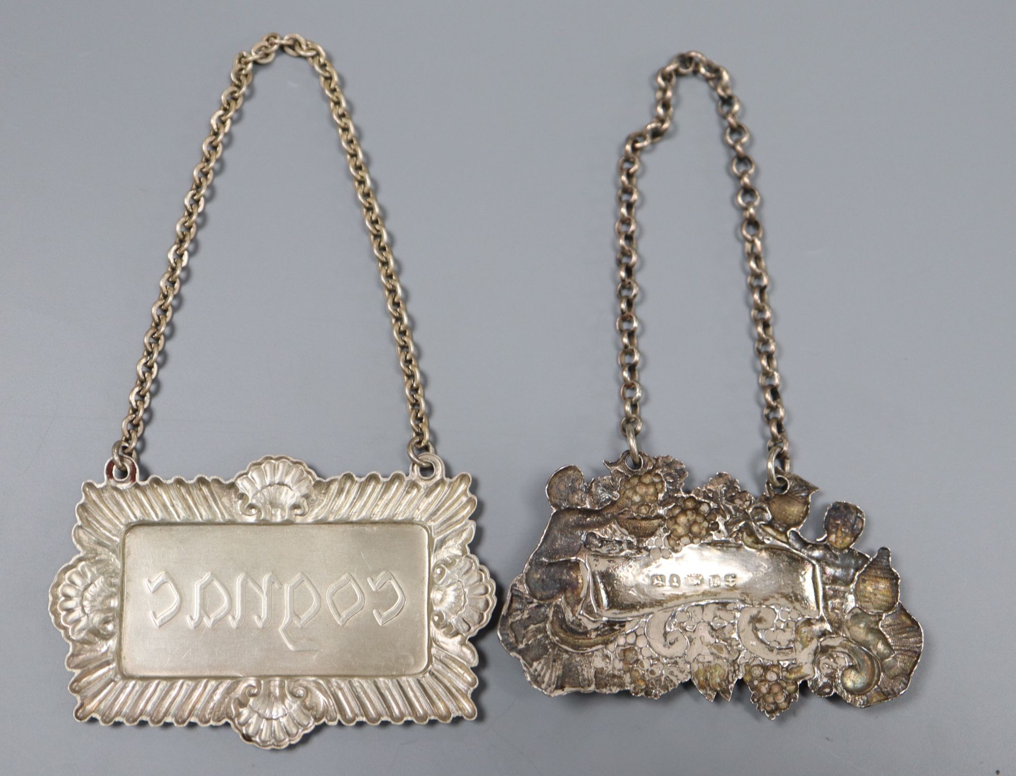 A William IV silver Brandy wine label, Joseph Wilmore, Birmingham, 1831, 59mm & a modern sterling Cognac label.